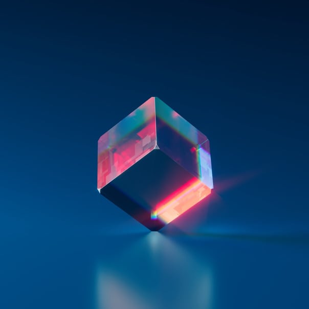 Glassy cube standing on one of its corners